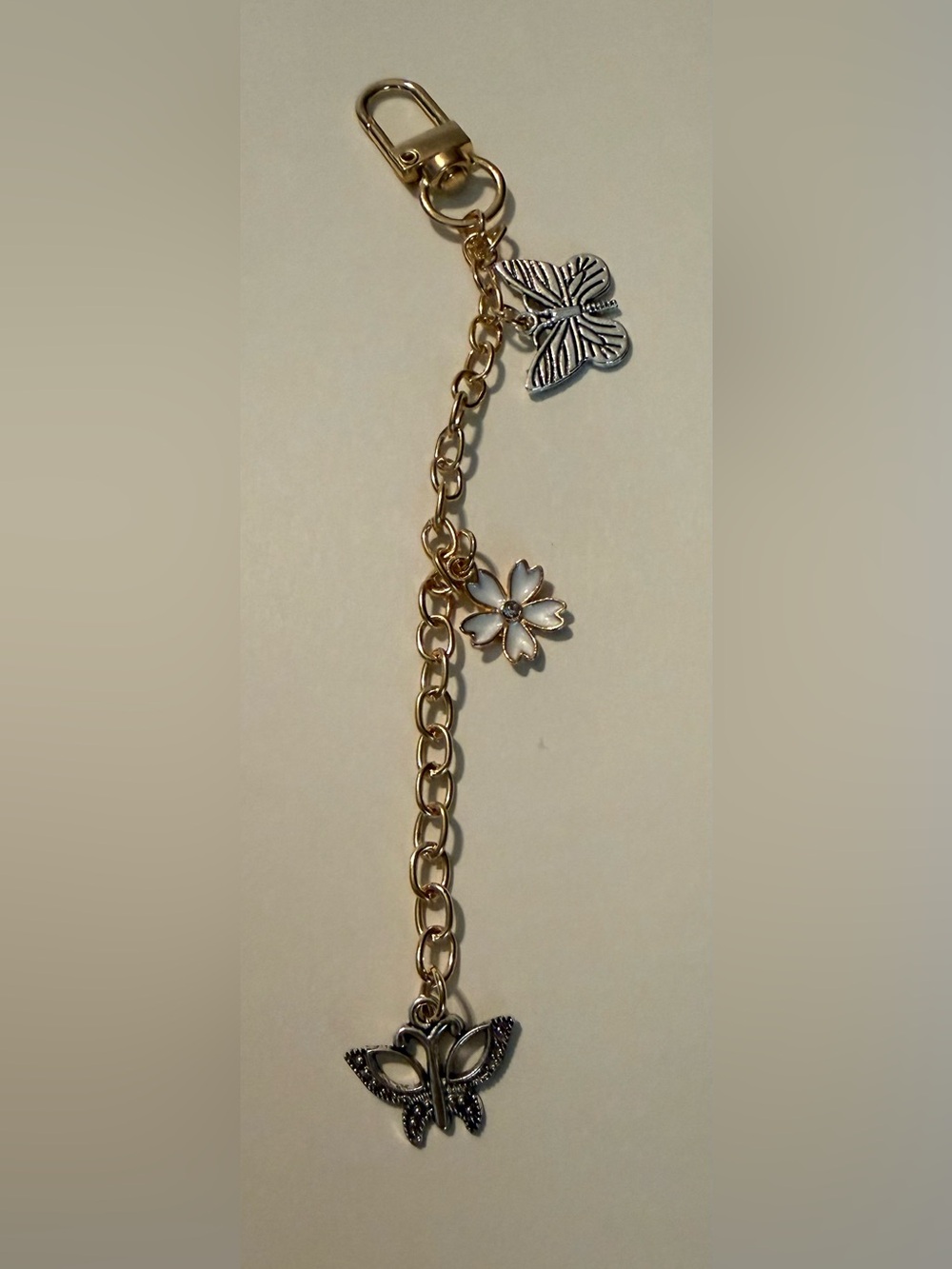 Gold-Tone Sakura Flower Charm with White Enamel